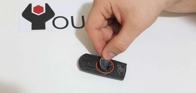 how to install new battery in mazda key remote